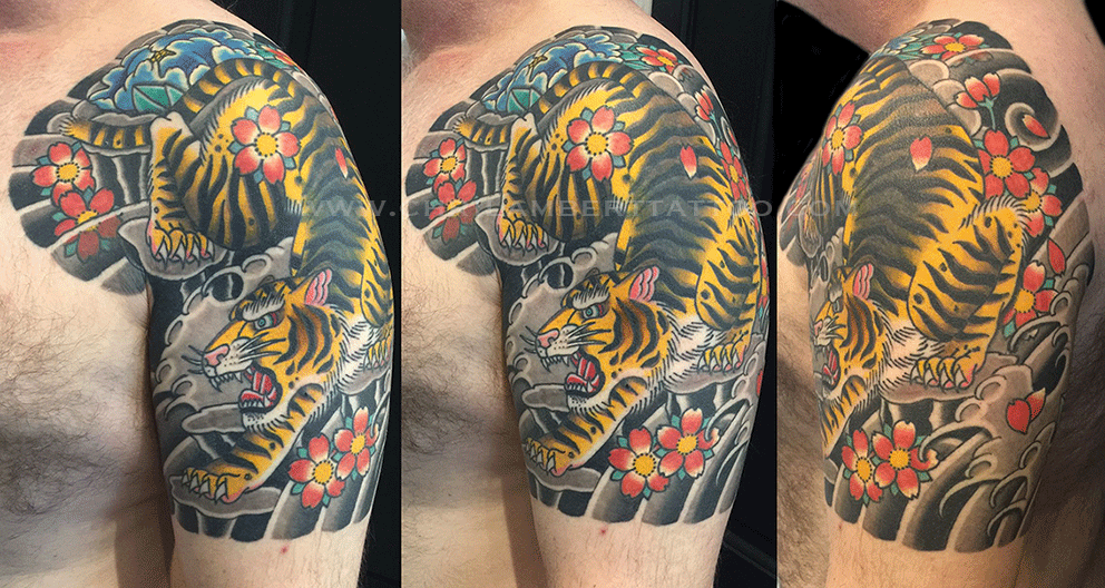 Japanese traditional tiger and peony sleeve by Barrett Handel at Dark Wave  Tattoo in TX. : r/tattoo